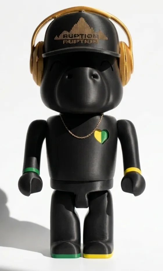DJ Ruption custom buffalo, front with gold headphones and Jamaica-colored heart